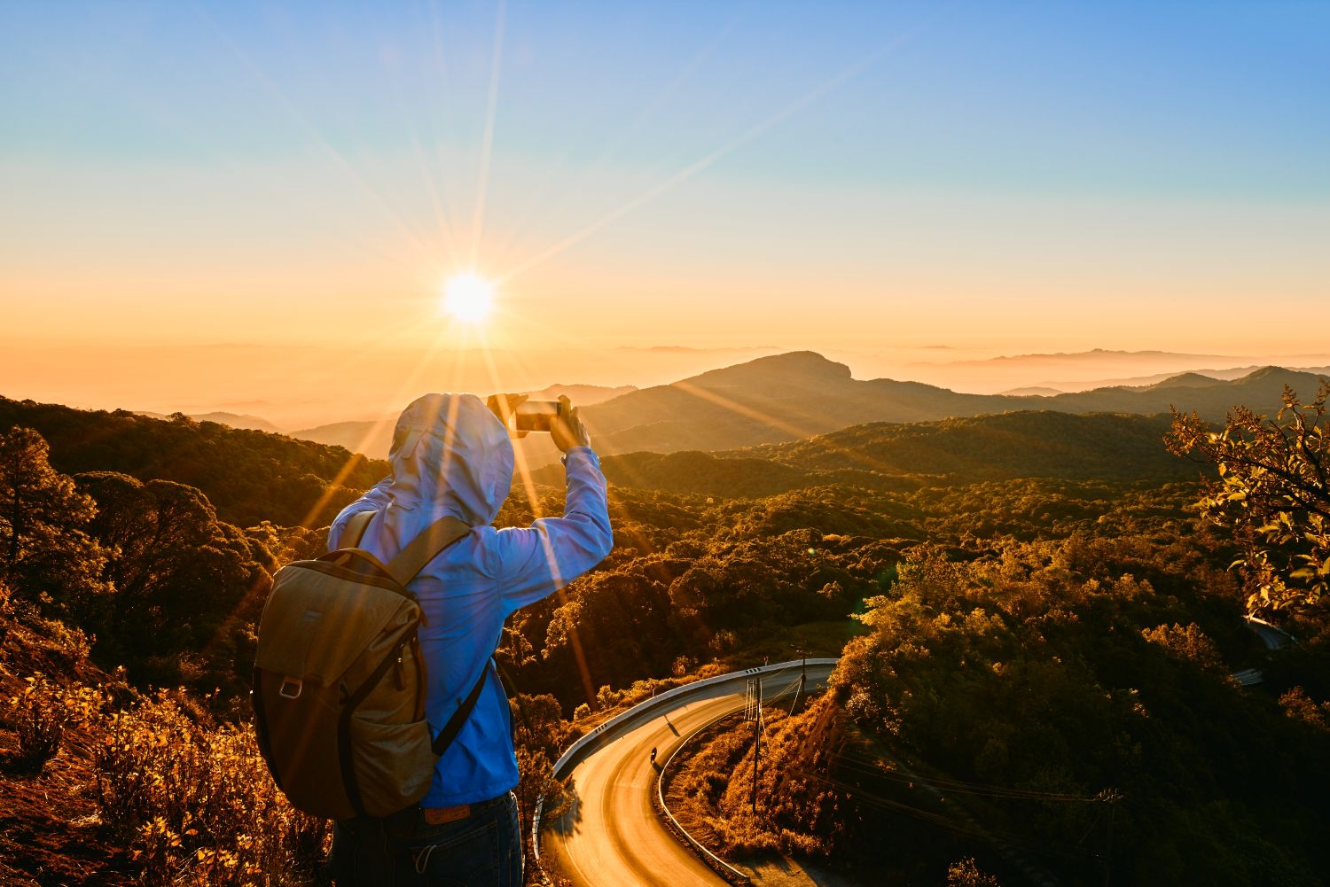 traveller taking in beautiful landscape